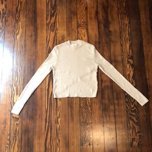 Long sleeve, ribbed top with cross back